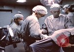 Image of wounded United States soldier Vietnam, 1969, second 9 stock footage video 65675022612