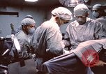 Image of wounded United States soldier Vietnam, 1969, second 11 stock footage video 65675022612