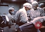 Image of wounded United States soldier Vietnam, 1969, second 13 stock footage video 65675022612