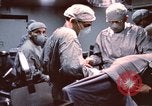Image of wounded United States soldier Vietnam, 1969, second 14 stock footage video 65675022612