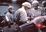 Image of wounded United States soldier Vietnam, 1969, second 15 stock footage video 65675022612