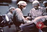 Image of wounded United States soldier Vietnam, 1969, second 16 stock footage video 65675022612
