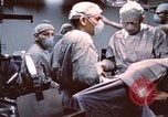 Image of wounded United States soldier Vietnam, 1969, second 19 stock footage video 65675022612