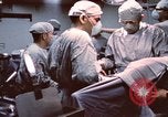 Image of wounded United States soldier Vietnam, 1969, second 21 stock footage video 65675022612