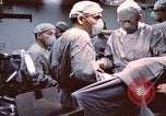 Image of wounded United States soldier Vietnam, 1969, second 23 stock footage video 65675022612