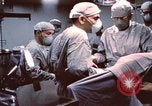 Image of wounded United States soldier Vietnam, 1969, second 25 stock footage video 65675022612