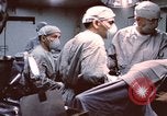 Image of wounded United States soldier Vietnam, 1969, second 27 stock footage video 65675022612