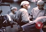 Image of wounded United States soldier Vietnam, 1969, second 28 stock footage video 65675022612