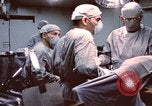 Image of wounded United States soldier Vietnam, 1969, second 30 stock footage video 65675022612