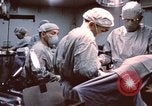 Image of wounded United States soldier Vietnam, 1969, second 31 stock footage video 65675022612