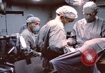 Image of wounded United States soldier Vietnam, 1969, second 32 stock footage video 65675022612