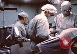 Image of wounded United States soldier Vietnam, 1969, second 33 stock footage video 65675022612