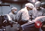 Image of wounded United States soldier Vietnam, 1969, second 34 stock footage video 65675022612