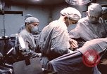 Image of wounded United States soldier Vietnam, 1969, second 36 stock footage video 65675022612