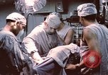 Image of wounded United States soldier Vietnam, 1969, second 37 stock footage video 65675022612