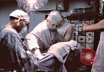Image of wounded United States soldier Vietnam, 1969, second 41 stock footage video 65675022612