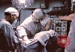 Image of wounded United States soldier Vietnam, 1969, second 42 stock footage video 65675022612