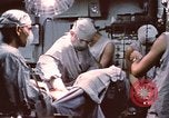 Image of wounded United States soldier Vietnam, 1969, second 44 stock footage video 65675022612