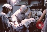 Image of wounded United States soldier Vietnam, 1969, second 45 stock footage video 65675022612