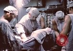 Image of wounded United States soldier Vietnam, 1969, second 46 stock footage video 65675022612