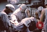 Image of wounded United States soldier Vietnam, 1969, second 47 stock footage video 65675022612
