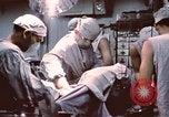 Image of wounded United States soldier Vietnam, 1969, second 48 stock footage video 65675022612