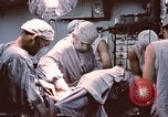 Image of wounded United States soldier Vietnam, 1969, second 49 stock footage video 65675022612