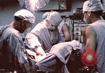 Image of wounded United States soldier Vietnam, 1969, second 51 stock footage video 65675022612