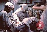 Image of wounded United States soldier Vietnam, 1969, second 53 stock footage video 65675022612