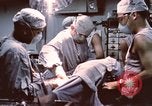 Image of wounded United States soldier Vietnam, 1969, second 56 stock footage video 65675022612