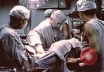 Image of wounded United States soldier Vietnam, 1969, second 59 stock footage video 65675022612