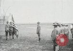 Image of US Army troops and band marching with flag during training United States USA, 1916, second 3 stock footage video 65675022632