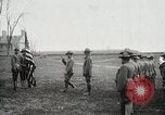 Image of US Army troops and band marching with flag during training United States USA, 1916, second 5 stock footage video 65675022632