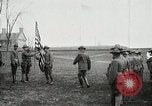 Image of US Army troops and band marching with flag during training United States USA, 1916, second 7 stock footage video 65675022632