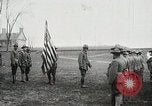 Image of US Army troops and band marching with flag during training United States USA, 1916, second 8 stock footage video 65675022632
