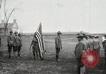 Image of US Army troops and band marching with flag during training United States USA, 1916, second 9 stock footage video 65675022632