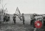 Image of US Army troops and band marching with flag during training United States USA, 1916, second 11 stock footage video 65675022632
