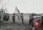 Image of US Army troops and band marching with flag during training United States USA, 1916, second 12 stock footage video 65675022632