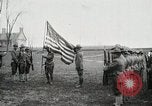 Image of US Army troops and band marching with flag during training United States USA, 1916, second 13 stock footage video 65675022632