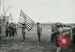 Image of US Army troops and band marching with flag during training United States USA, 1916, second 14 stock footage video 65675022632