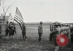 Image of US Army troops and band marching with flag during training United States USA, 1916, second 15 stock footage video 65675022632
