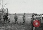 Image of US Army troops and band marching with flag during training United States USA, 1916, second 17 stock footage video 65675022632