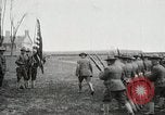 Image of US Army troops and band marching with flag during training United States USA, 1916, second 21 stock footage video 65675022632