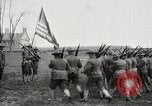 Image of US Army troops and band marching with flag during training United States USA, 1916, second 22 stock footage video 65675022632