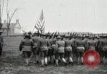 Image of US Army troops and band marching with flag during training United States USA, 1916, second 23 stock footage video 65675022632