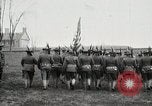 Image of US Army troops and band marching with flag during training United States USA, 1916, second 24 stock footage video 65675022632