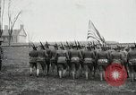 Image of US Army troops and band marching with flag during training United States USA, 1916, second 25 stock footage video 65675022632