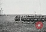Image of US Army troops and band marching with flag during training United States USA, 1916, second 31 stock footage video 65675022632