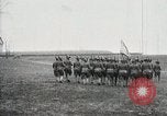 Image of US Army troops and band marching with flag during training United States USA, 1916, second 32 stock footage video 65675022632