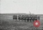 Image of US Army troops and band marching with flag during training United States USA, 1916, second 33 stock footage video 65675022632